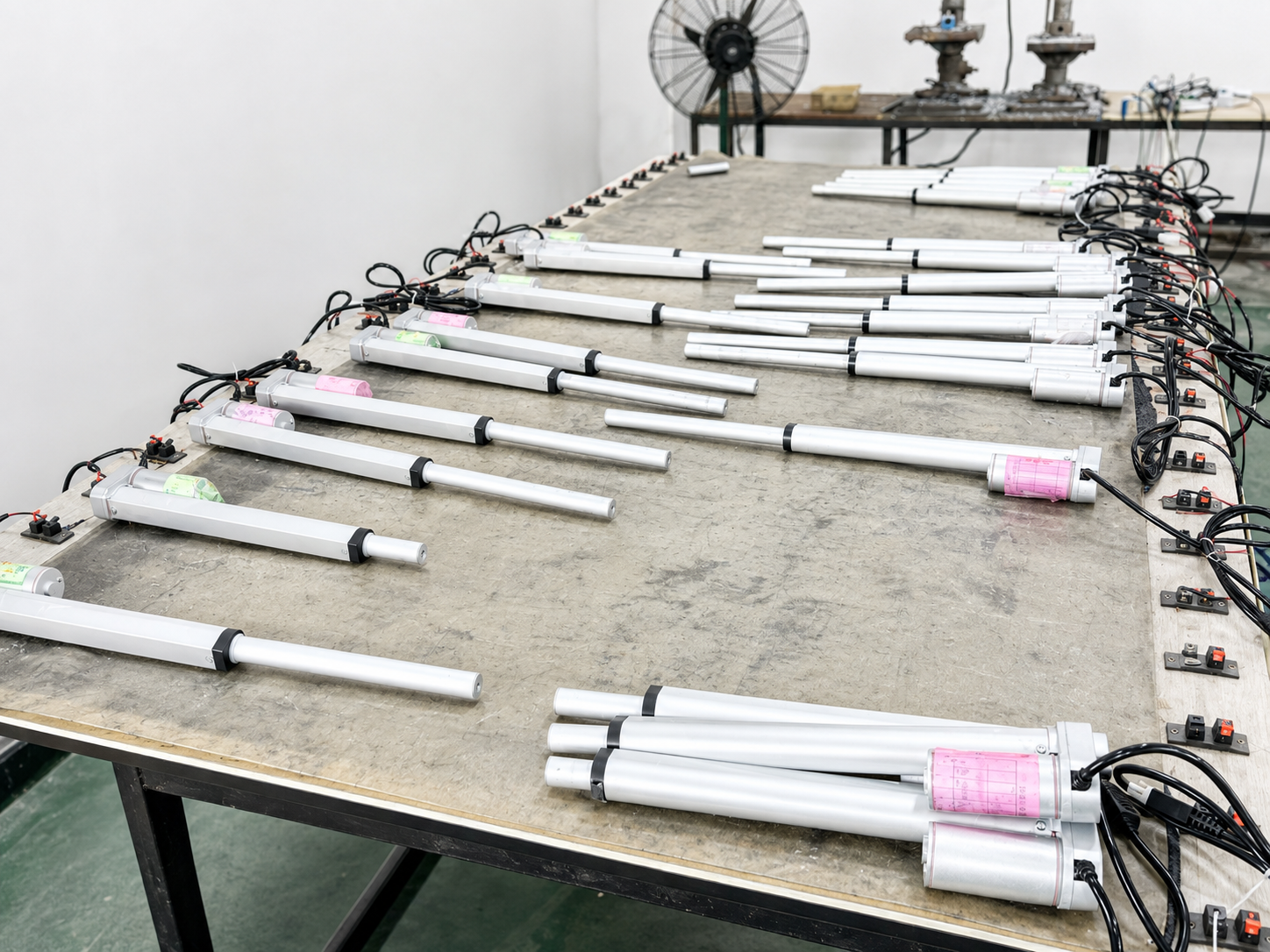 Assembly line with multiple linear actuators
